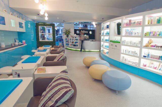 Bliss spa retail interior with curved shelving and seating