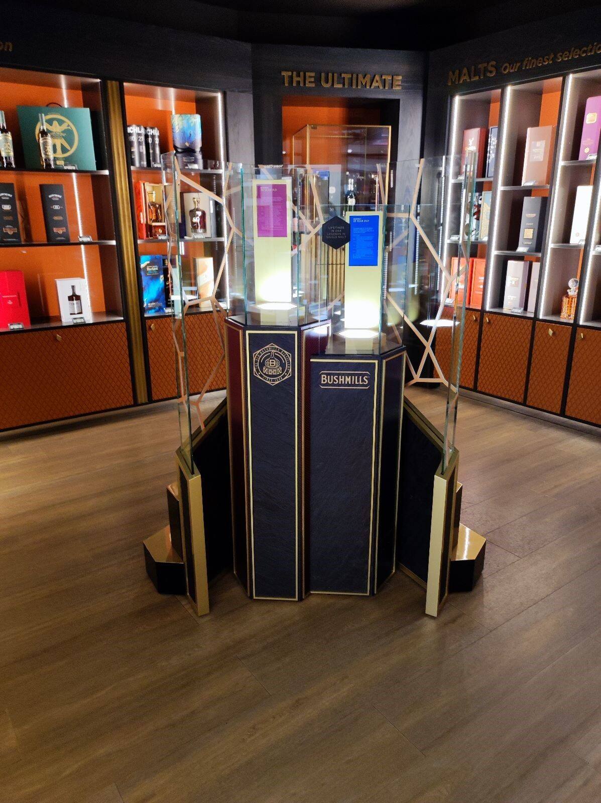 Premium spirits back-bar display with bottles