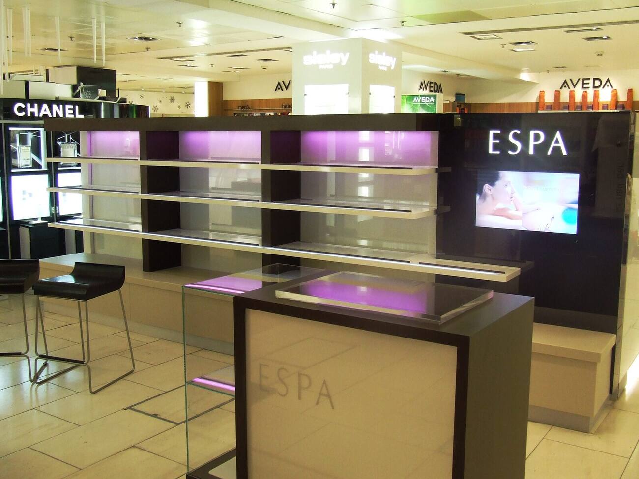ESPA skincare wall display with illuminated shelving, Harvey Nichols Leeds
