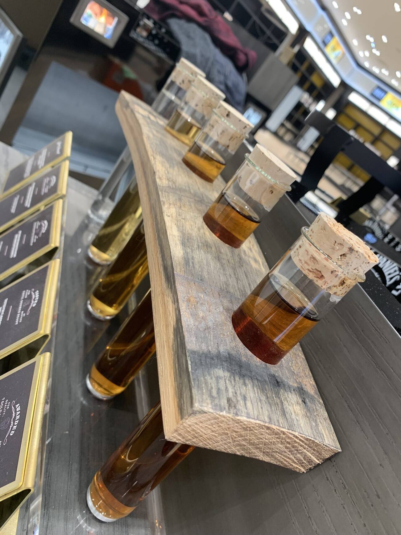 Rustic timber whisky tasting flight board