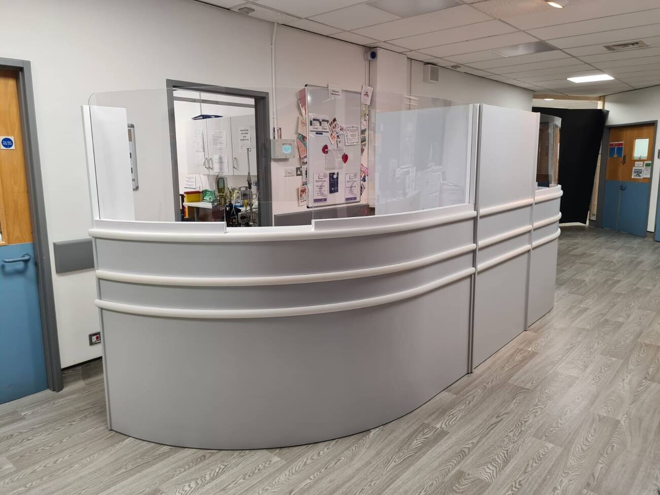 Grey curved ward reception desk