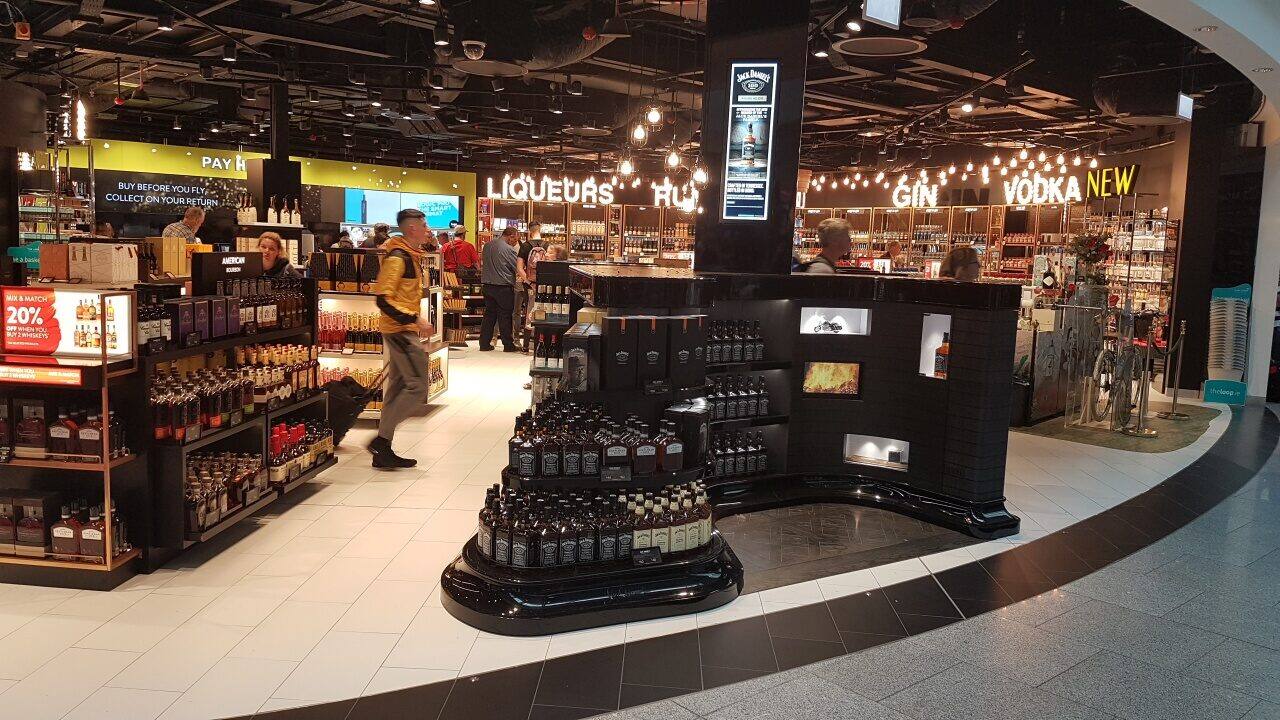 Branded spirits display in an airport duty free store