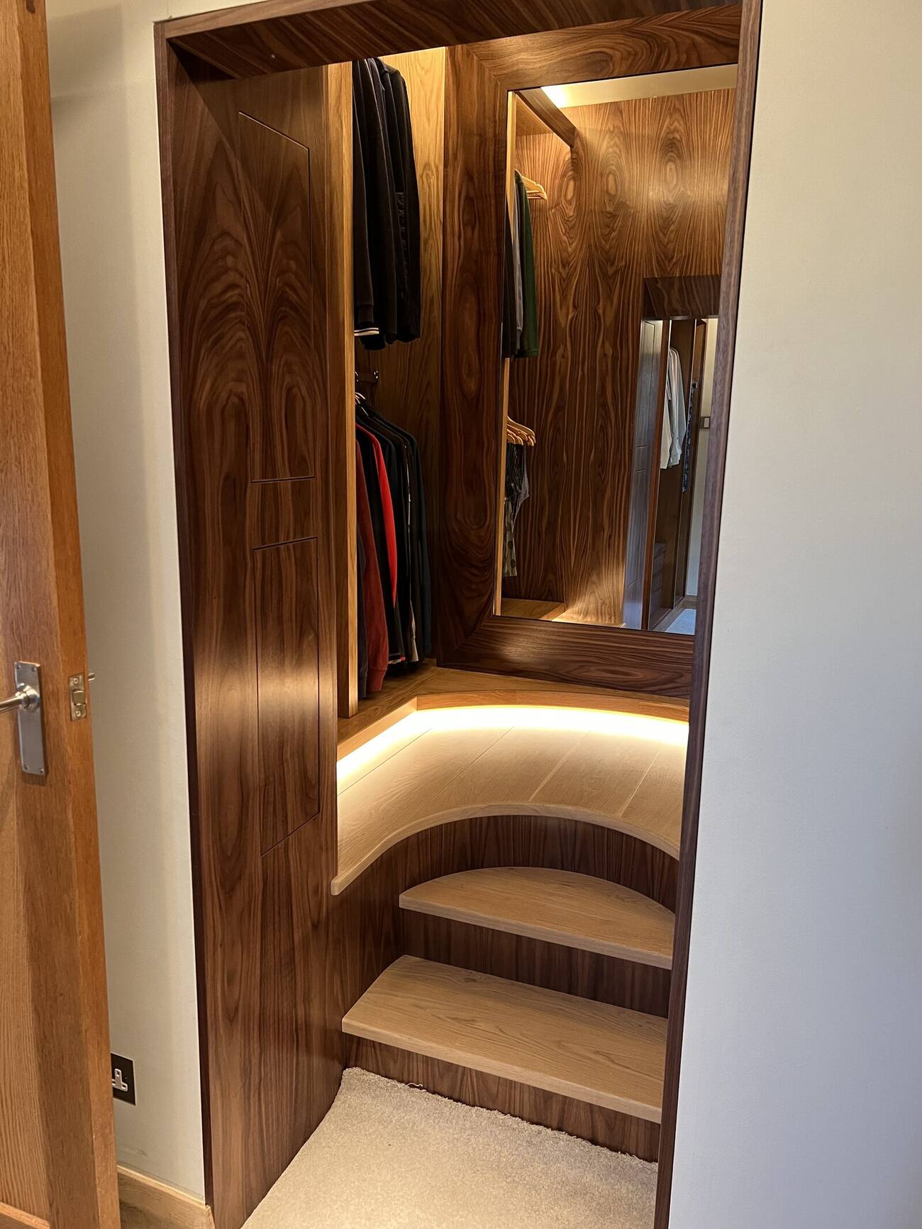 Walnut dressing room with integrated lighting