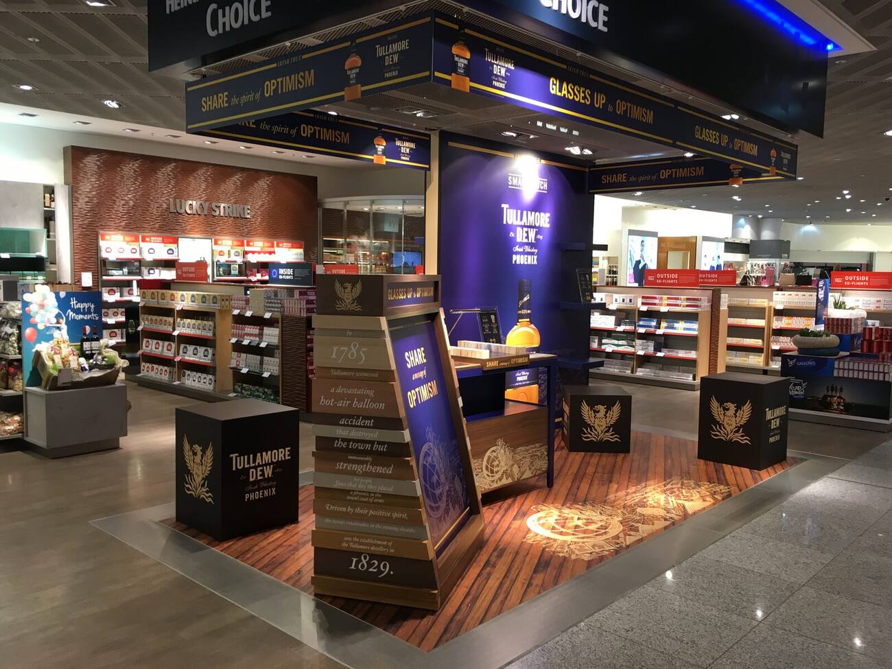 Tullamore D.E.W. branded whiskey retail area in an airport store