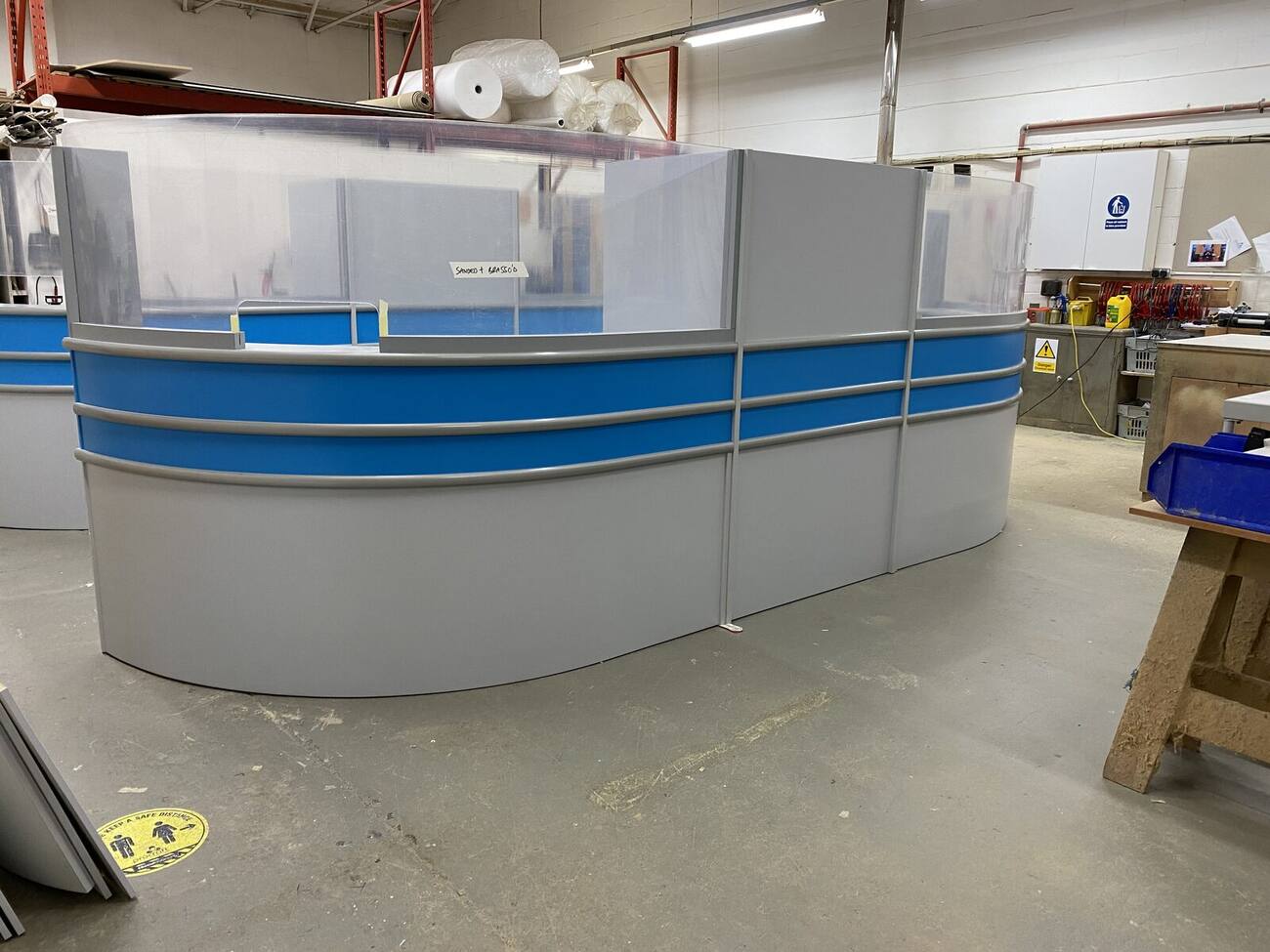 Blue and white reception counter in the factory